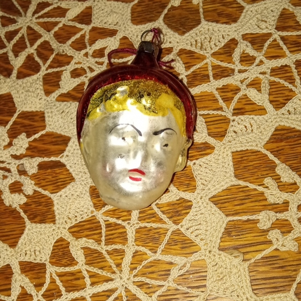 Vintage Glass Face Ornament with Red and Gold Accents